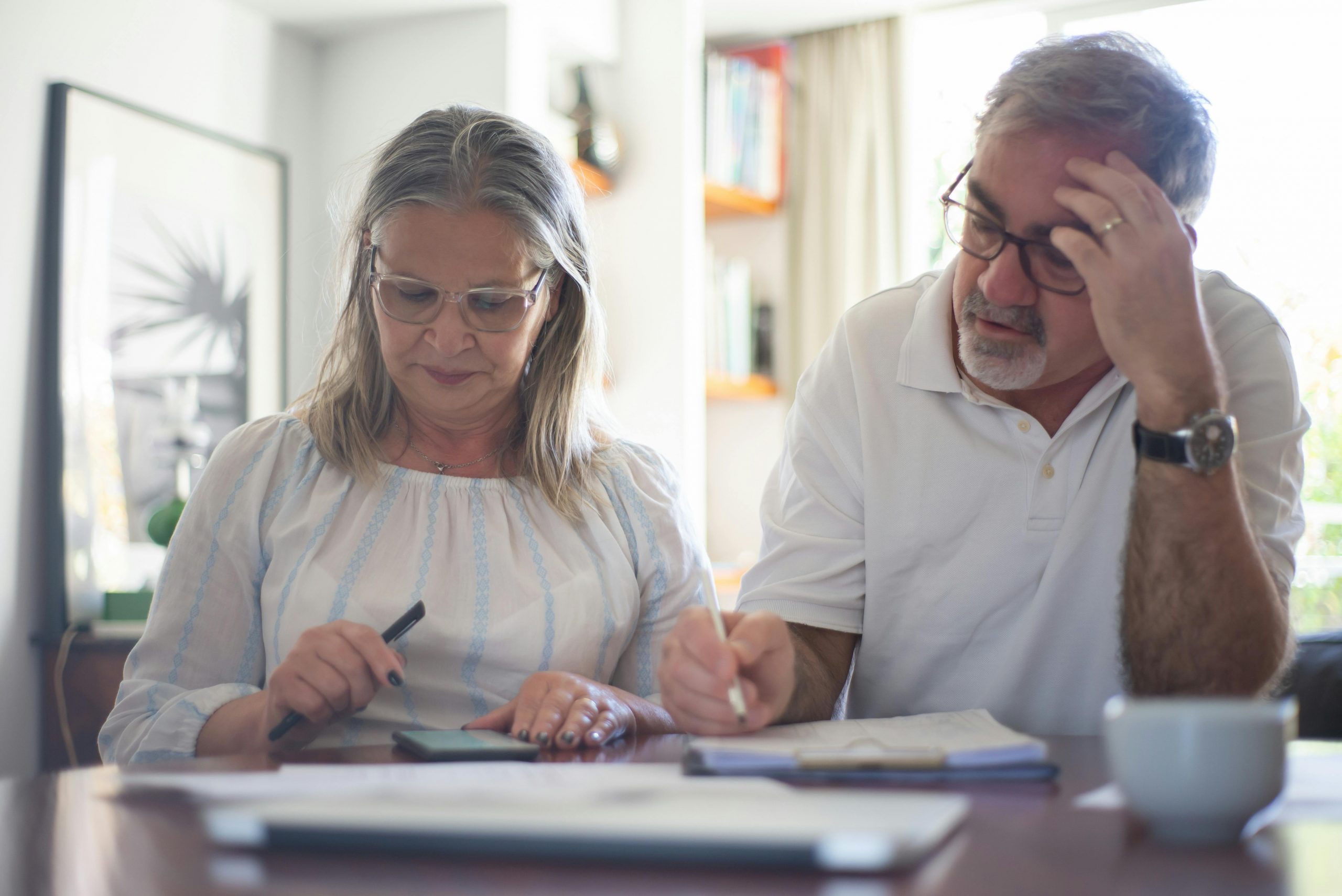 couple and documents on a table